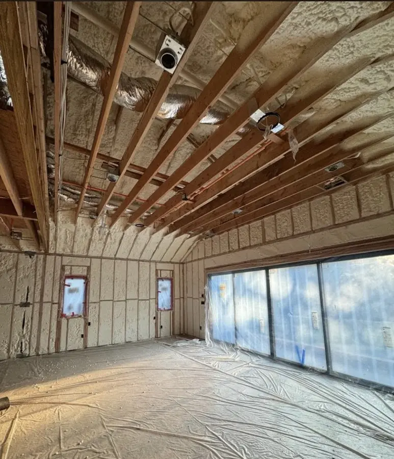 Interior walls and ceiling insulated with spray foam during new construction in Evans